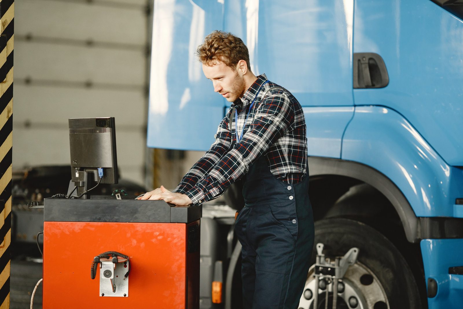 Truck in a service bay with the diagnostic port accessible